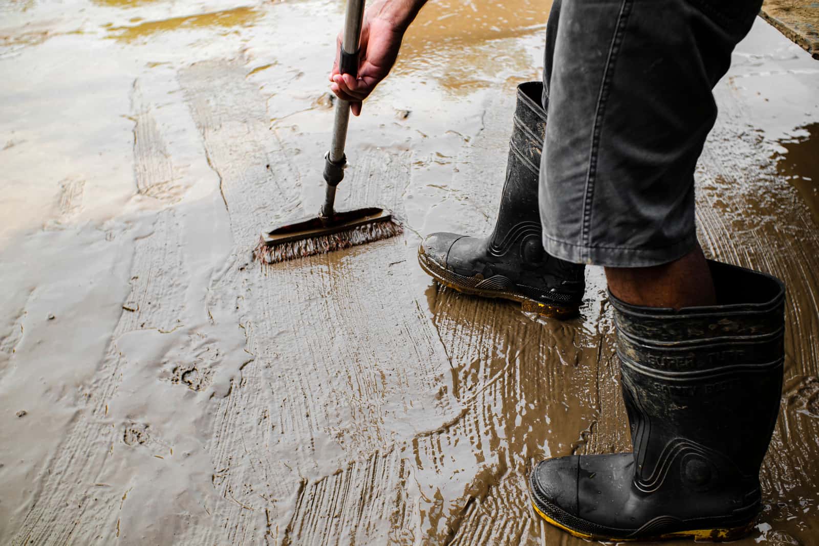 Boots caked in mud after outdoor work