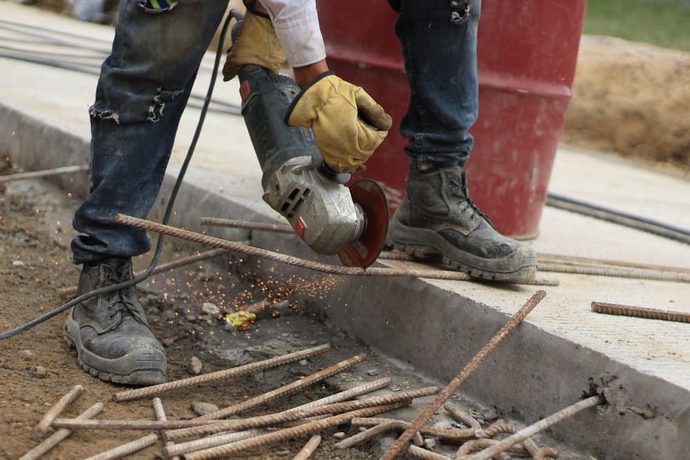 Work boots standing on a concrete floor